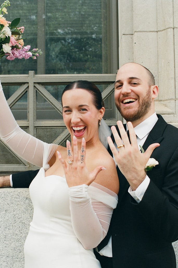 Couple Showing Wedding Rings